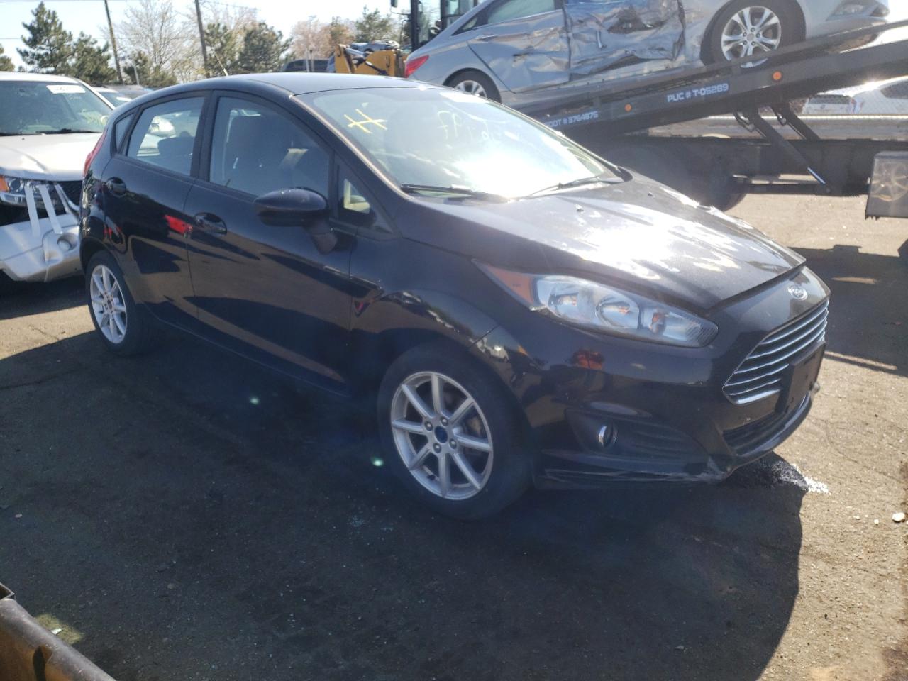 FORD FIESTA SE 2019 with VIN 3FADP4EJ9KM138549 - Photo from auction