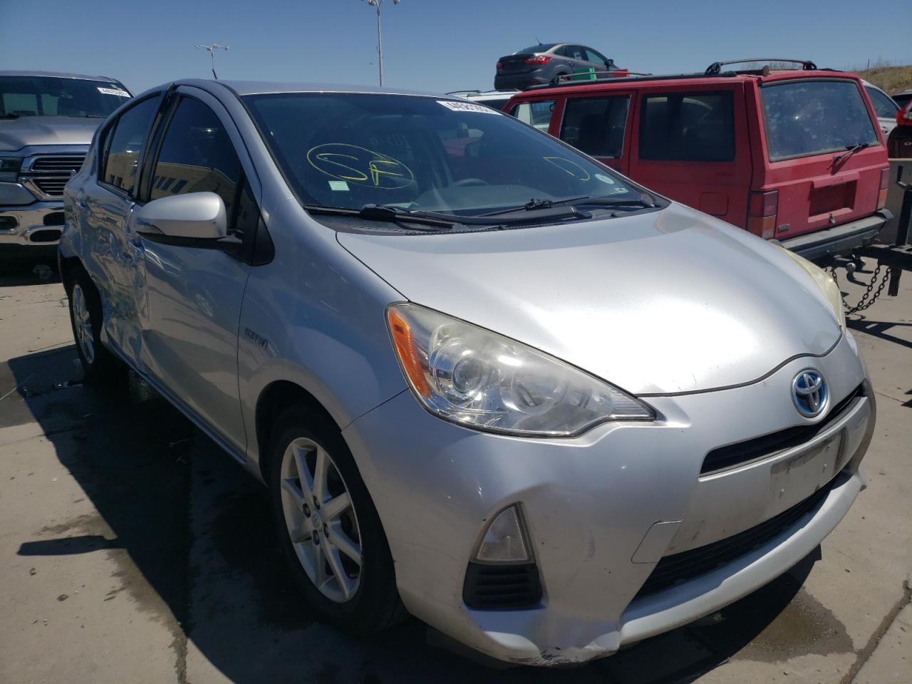 TOYOTA PRIUS C 2012 with VIN JTDKDTB33C1508693 - Photo from auction