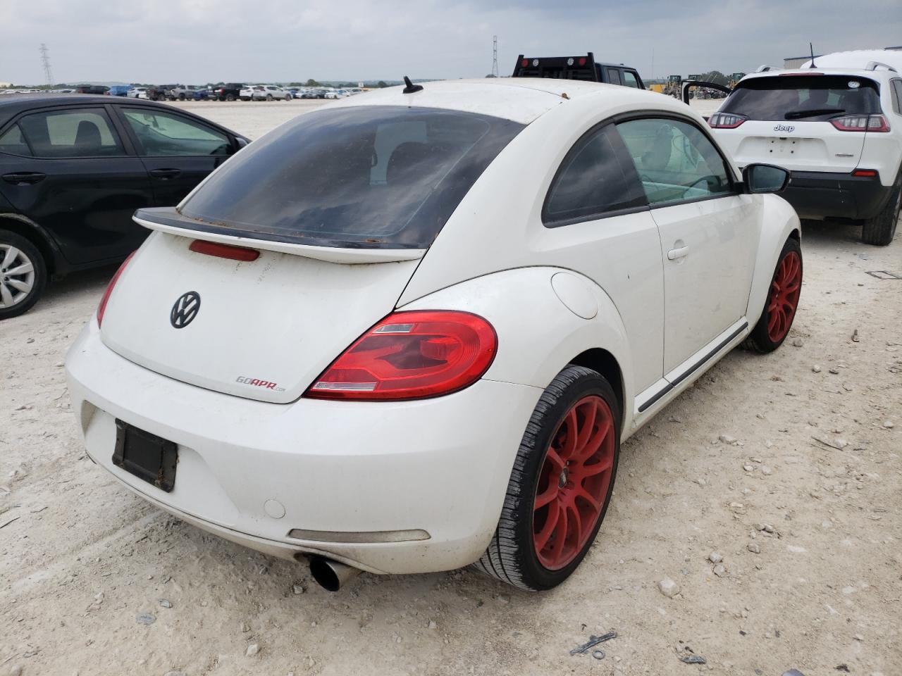 Photo 4 from auction – 2012 VOLKSWAGEN BEETLE TUR with VIN 3VWVA7ATXCM603539