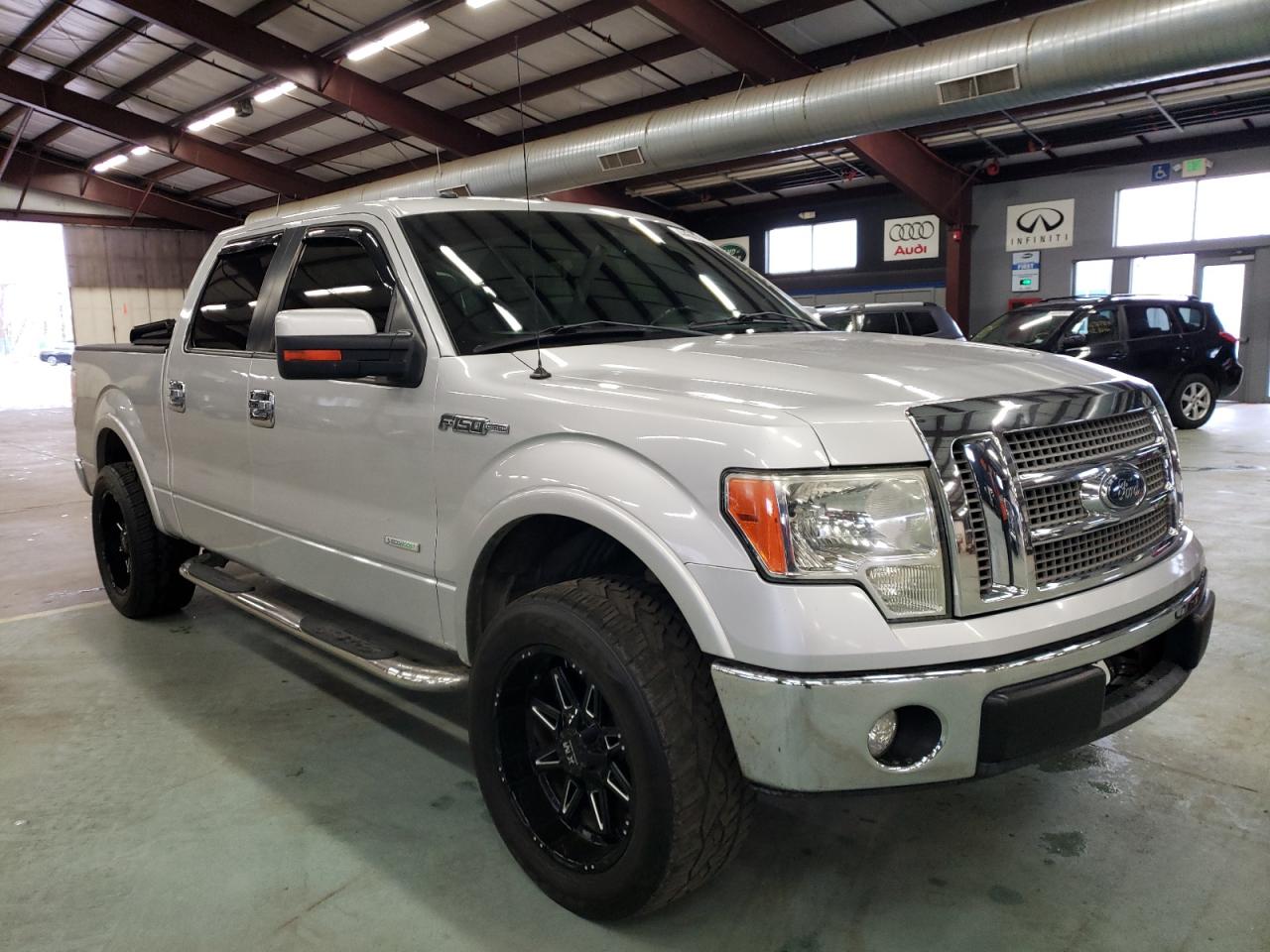 FORD F-150 2012 with VIN 1FTFW1CT7CFC23867 - Photo from auction