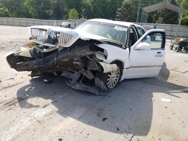 Photo 2 from auction – 2004 LINCOLN TOWN CAR E with VIN 1LNHM81W64Y633405