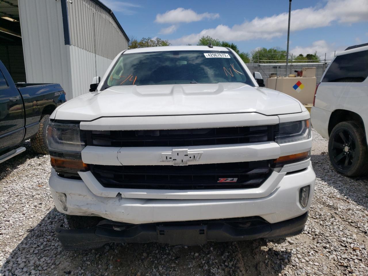 Photo 9 from auction – 2016 CHEVROLET SILVERADO with VIN 3GCUKREC1GG196037
