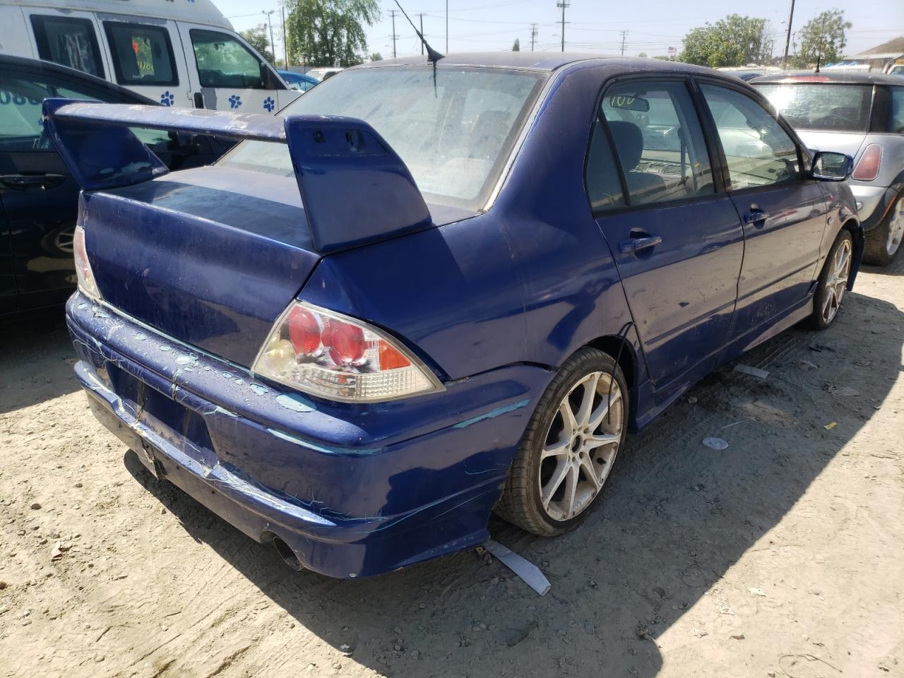 Photo 4 from auction – 2003 MITSUBISHI LANCER OZ with VIN JA3AJ86EX3U003244
