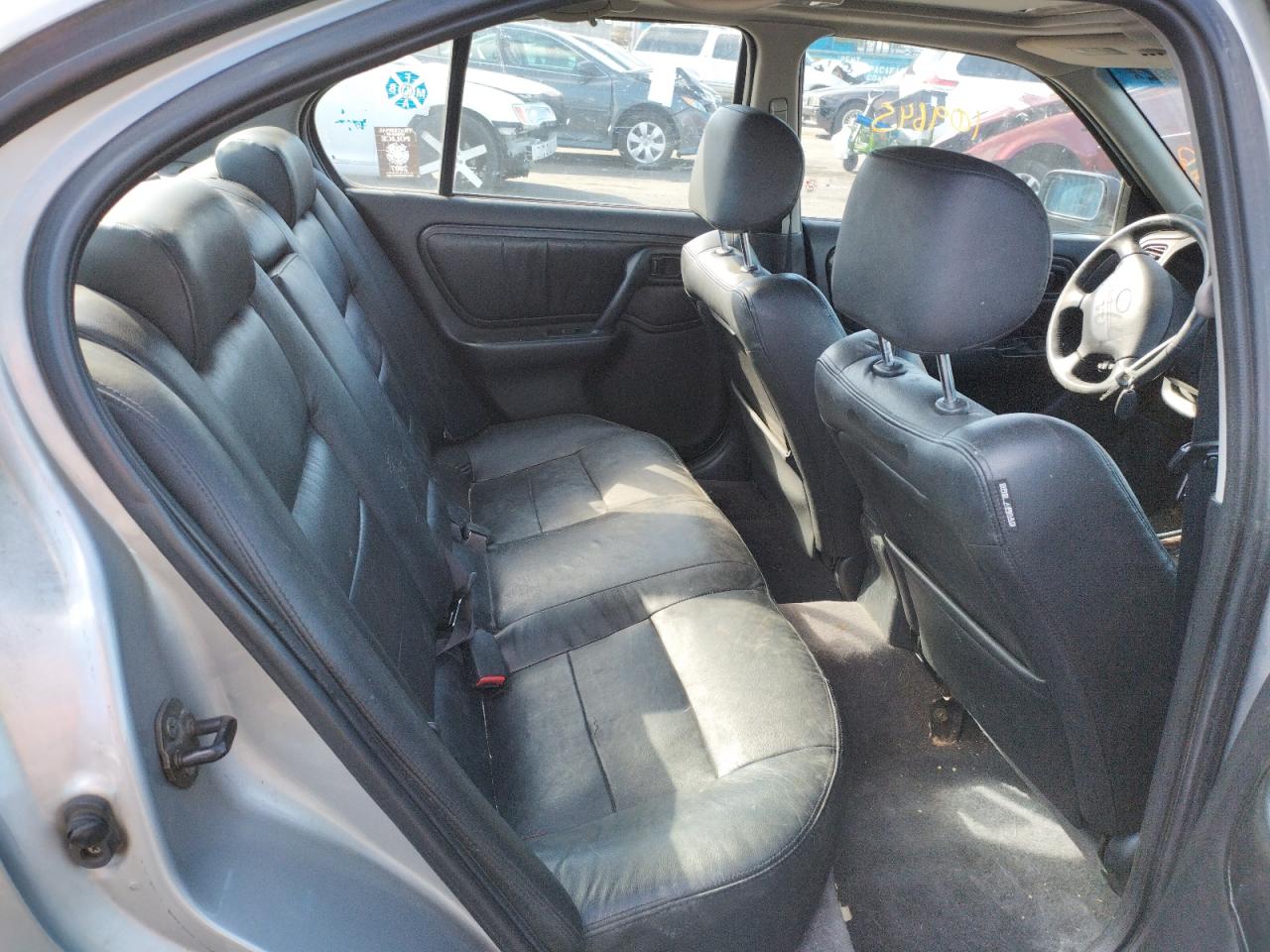 Photo 6 from auction – 2000 INFINITI G20 with VIN JNKCP11A4YT312434