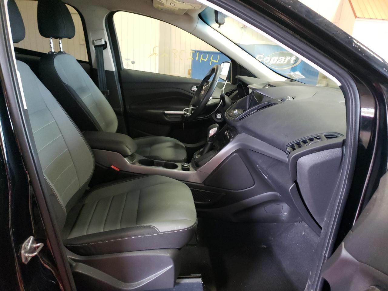 Photo 5 from auction – 2016 FORD ESCAPE SE with VIN 1FMCU9GX7GUC54537