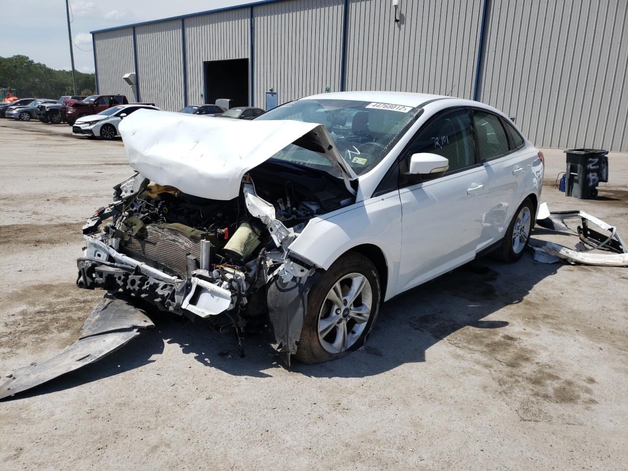 Photo 2 from auction – 2014 FORD FOCUS SE with VIN 1FADP3F22EL419938