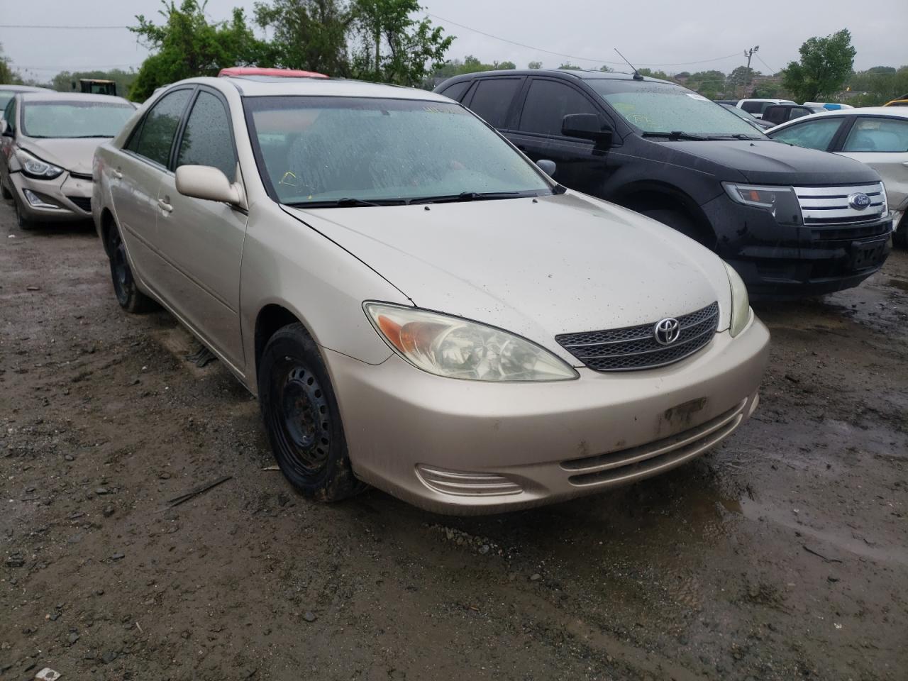 TOYOTA CAMRY LE 2004 with VIN 4T1BE30K54U299105 - Photo from auction