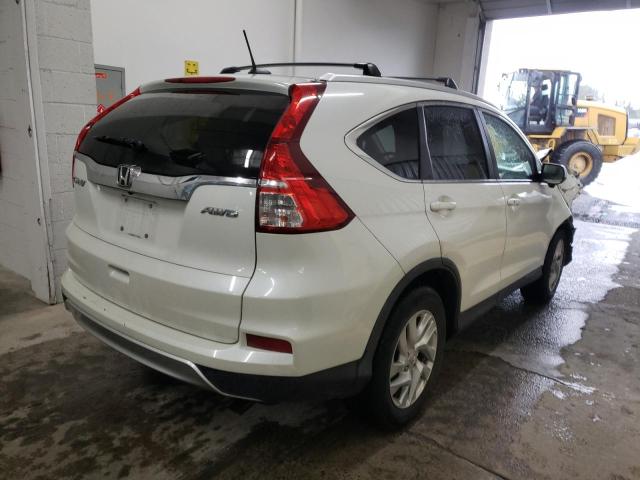 Photo 4 from auction – 2015 HONDA CR-V EXL with VIN 5J6RM4H70FL038012