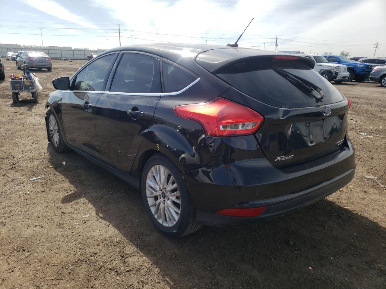 Photo 3 from auction – 2015 FORD FOCUS TITA with VIN 1FADP3N23FL275089