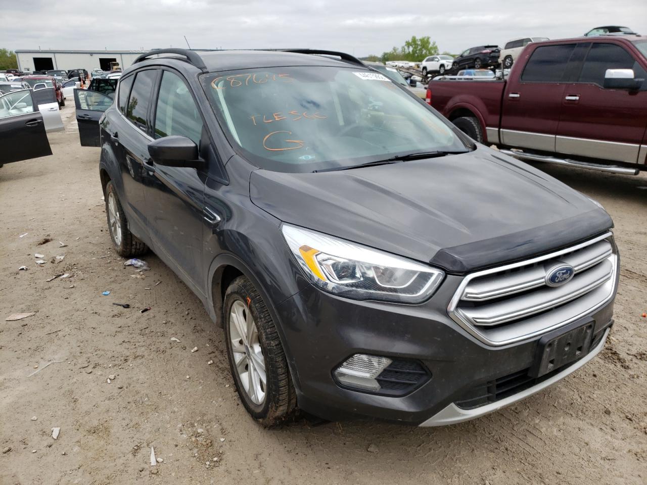 FORD ESCAPE SE 2017 with VIN 1FMCU9GD0HUC87645 - Photo from auction