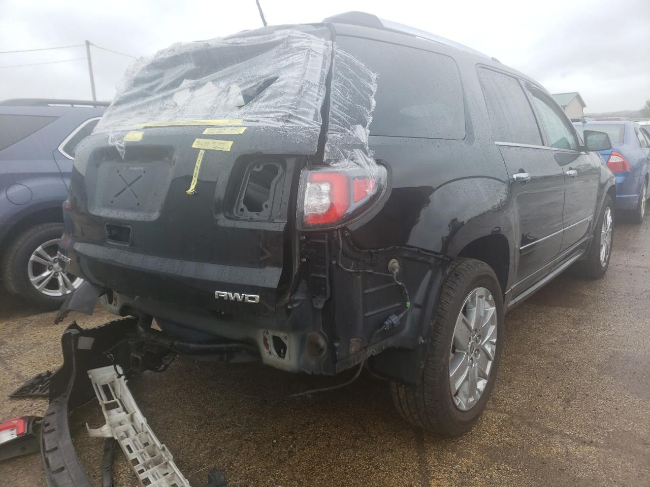 Photo 4 from auction – 2015 GMC ACADIA DEN with VIN 1GKKVTKD0FJ235033