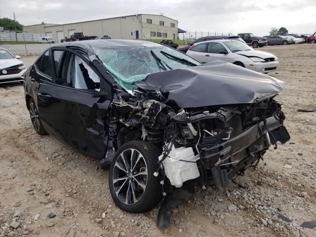TOYOTA COROLLA L 2017 with VIN 2T1BURHEXHC877310 - Photo from auction