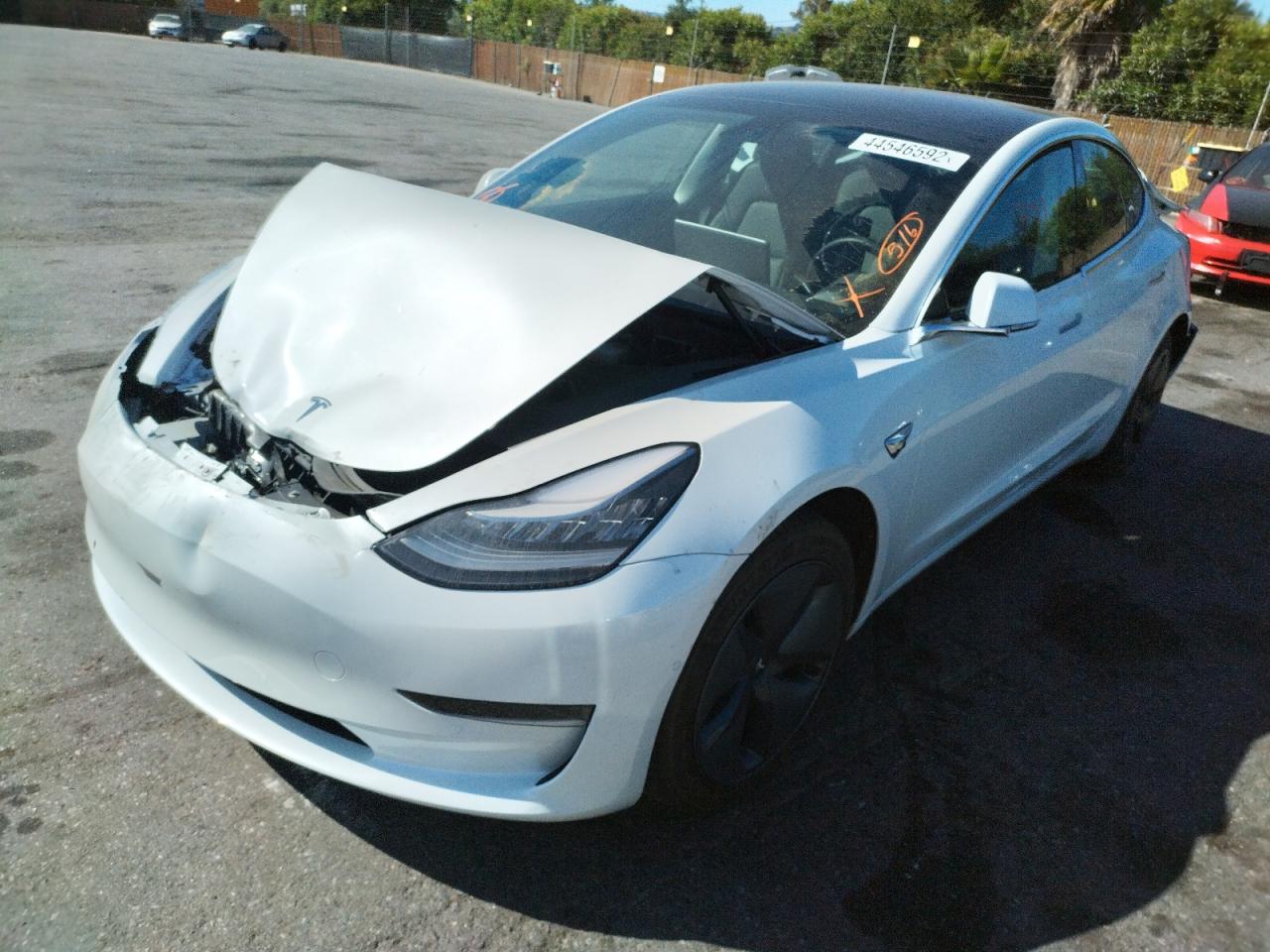 Photo 15 from auction – 2019 TESLA MODEL 3 with VIN 5YJ3E1EA3KF483414