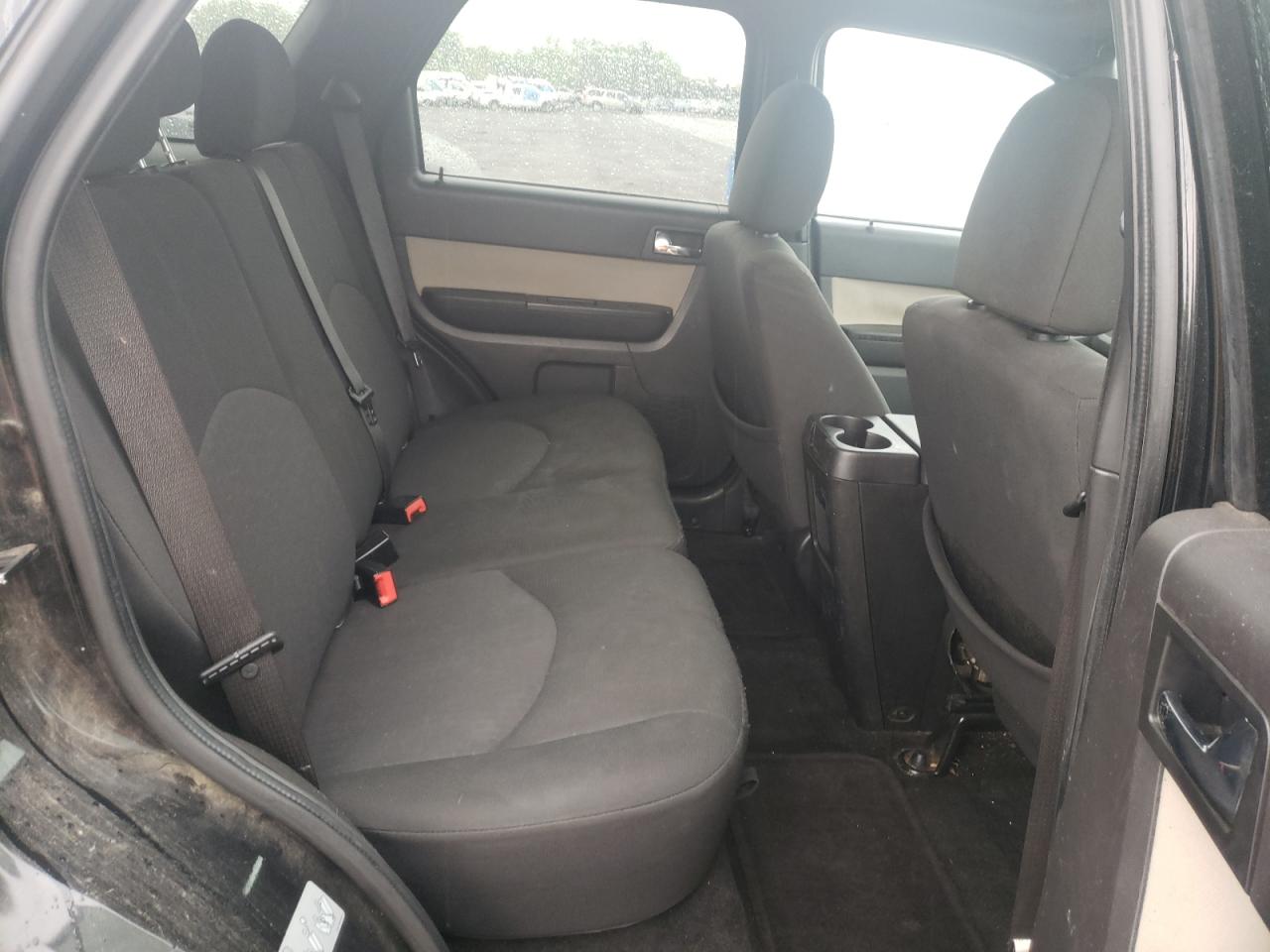 Photo 6 from auction – 2011 MERCURY MARINER with VIN 4M2CN8B79BKJ00364