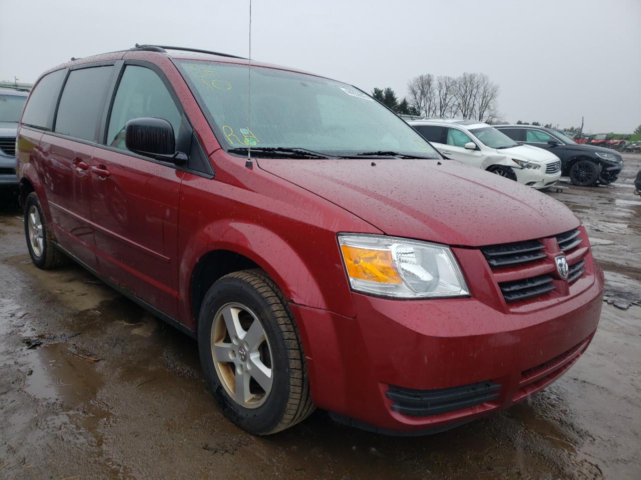 DODGE GRAND CARA 2010 with VIN 2D4RN3D17AR490217 - Photo from auction
