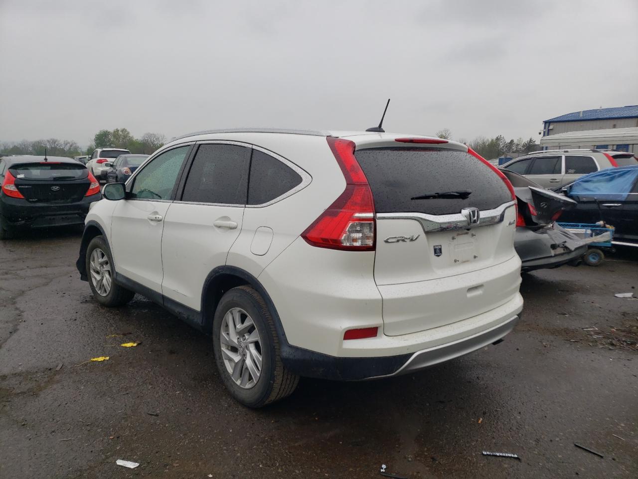 Photo 3 from auction – 2016 HONDA CR-V EXL with VIN 5J6RM4H79GL022571