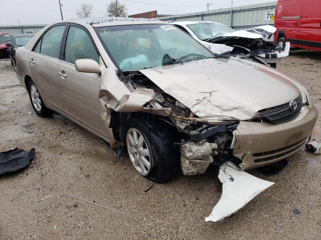 TOYOTA CAMRY LE 2003 with VIN 4T1BF30K53U060729 - Photo from auction