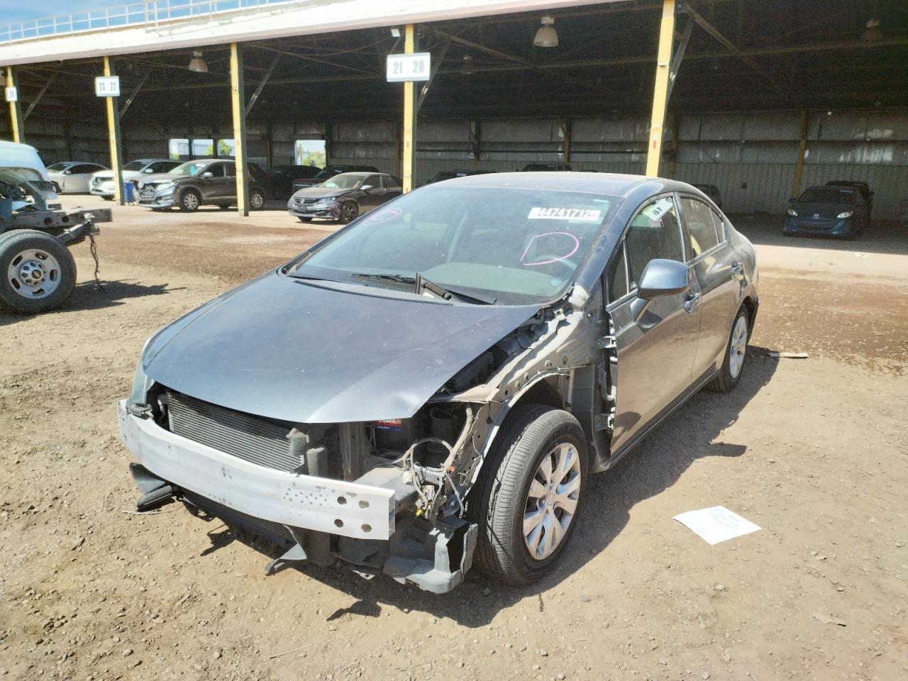 Photo 2 from auction – 2012 HONDA CIVIC LX with VIN 19XFB2F56CE090379