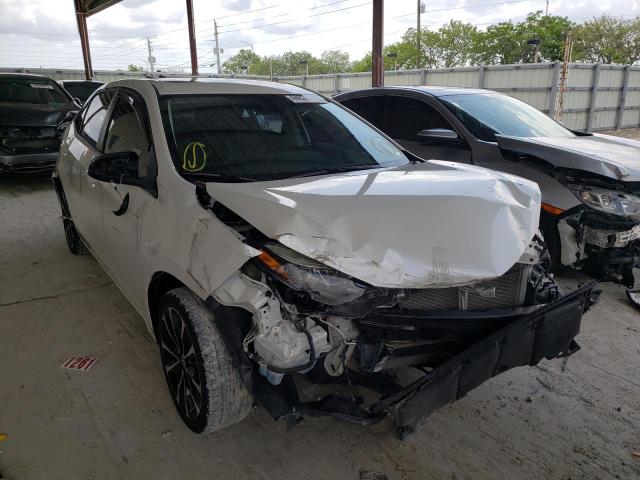 TOYOTA COROLLA L 2018 with VIN 5YFBURHE3JP764708 - Photo from auction