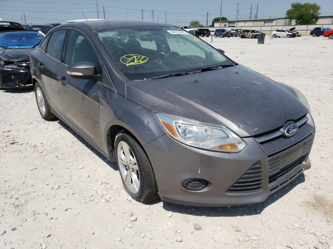 FORD FOCUS SE 2014 with VIN 1FADP3F28EL392809 - Photo from auction