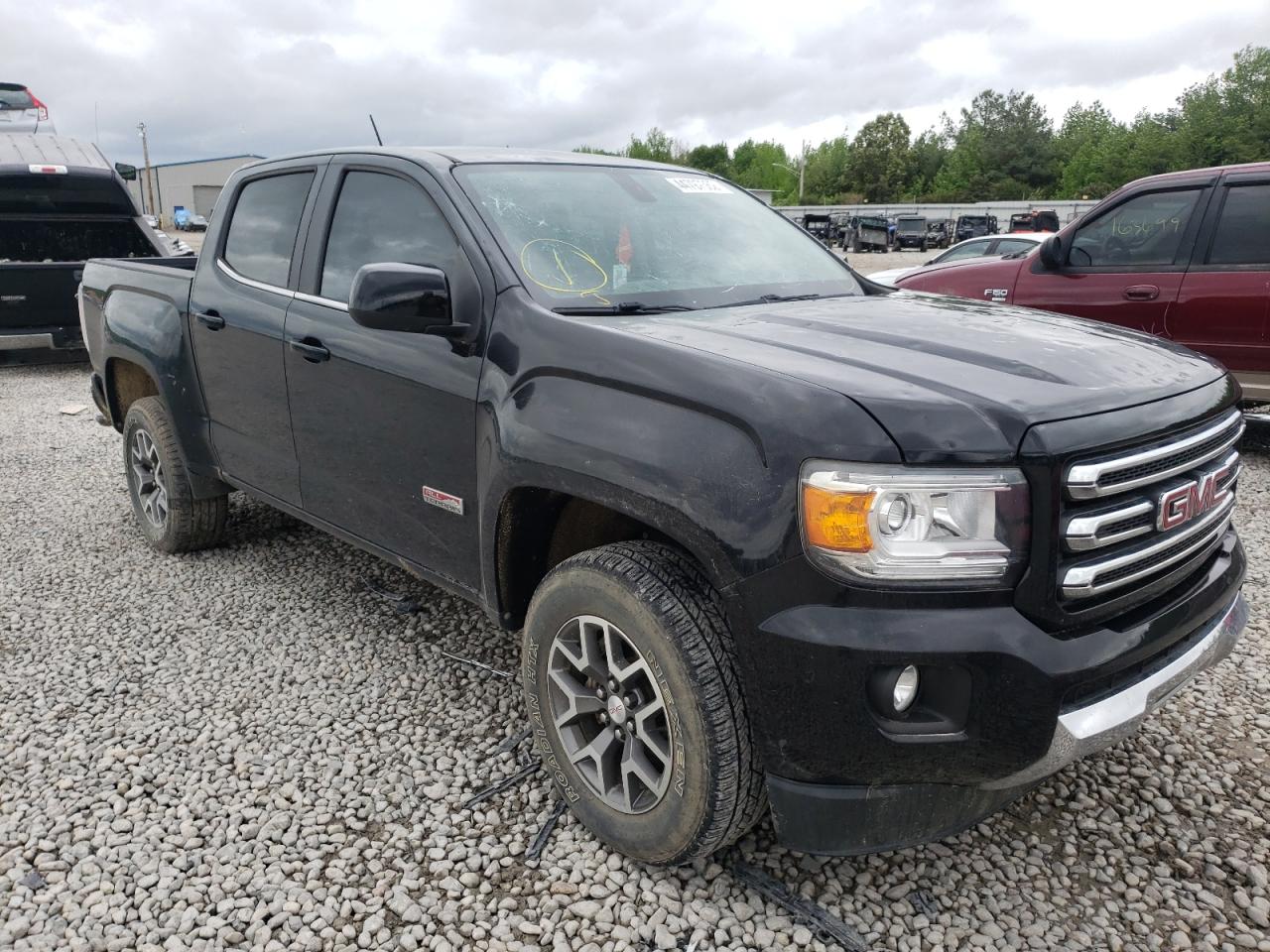 GMC CANYON SLE 2015 with VIN 1GTG6BE39F1205699 - Photo from auction