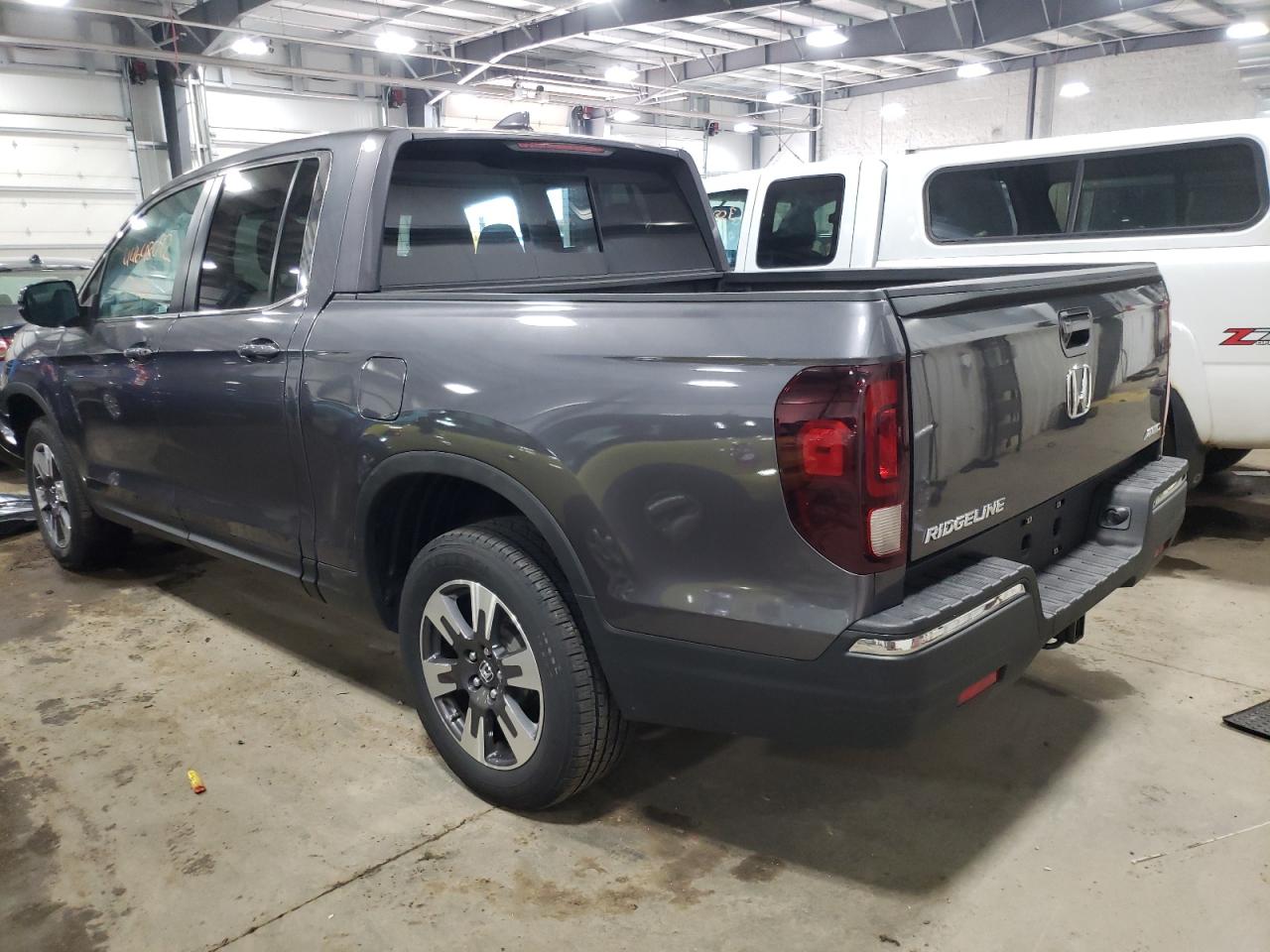 Photo 3 from auction – 2019 HONDA RIDGELINE with VIN 5FPYK3F58KB046852