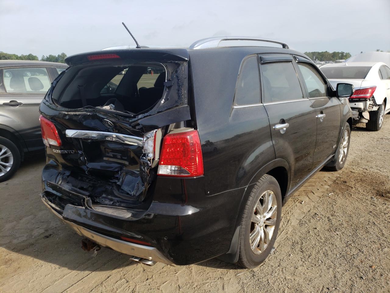Photo 4 from auction – 2012 KIA SORENTO SX with VIN 5XYKWDA21CG192719