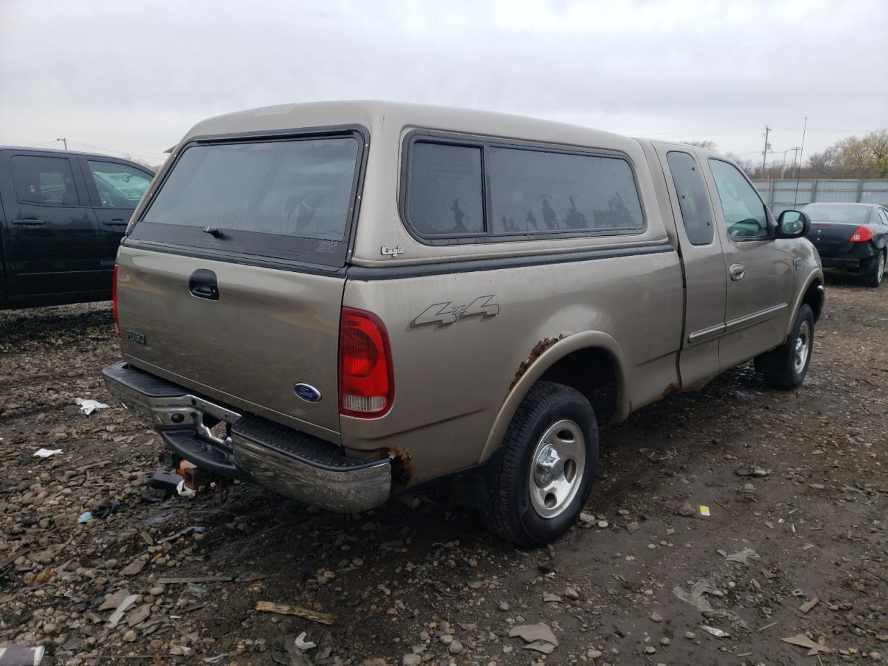 Photo 4 from auction – 2002 FORD F150 with VIN 1FTRX18LX2NB81704