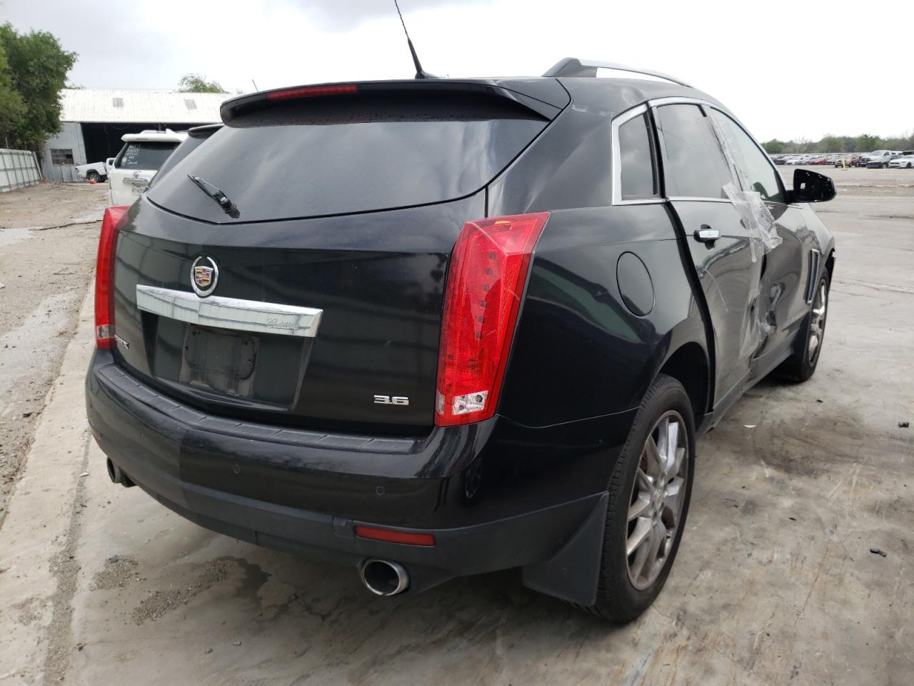 Photo 4 from auction – 2014 CADILLAC SRX PERFOR with VIN 3GYFNCE32ES561083