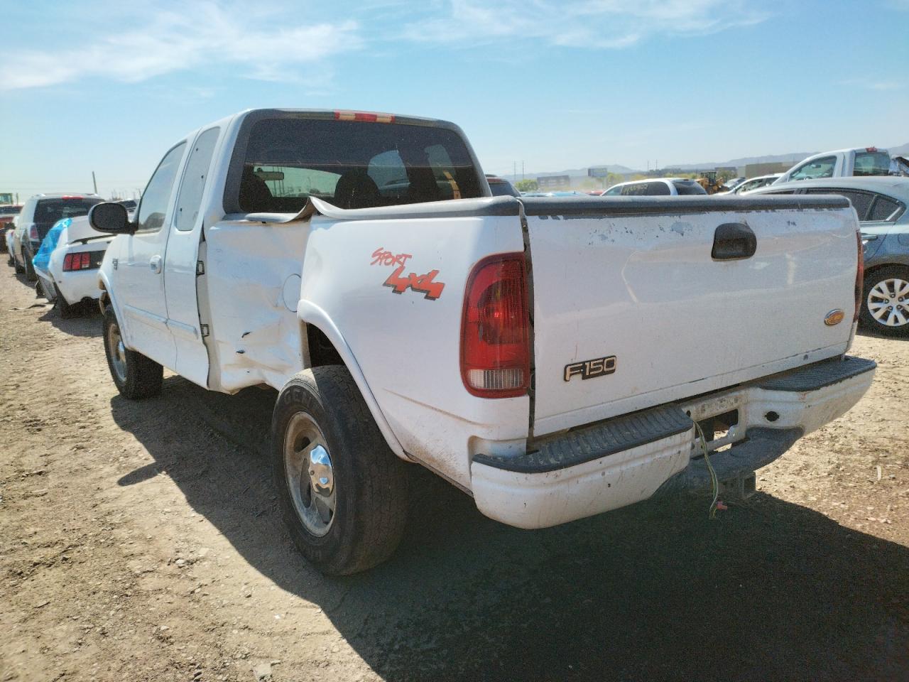 Photo 3 from auction – 2000 FORD F150 with VIN 1FTRX18W3YKA10538