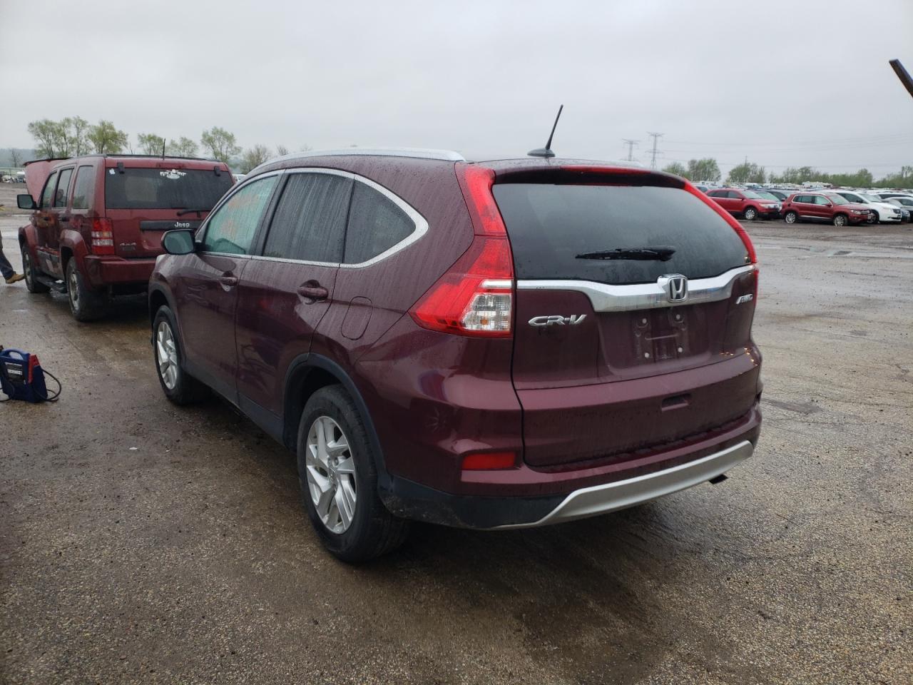 Photo 3 from auction – 2016 HONDA CR-V EXL with VIN 5J6RM4H76GL083120