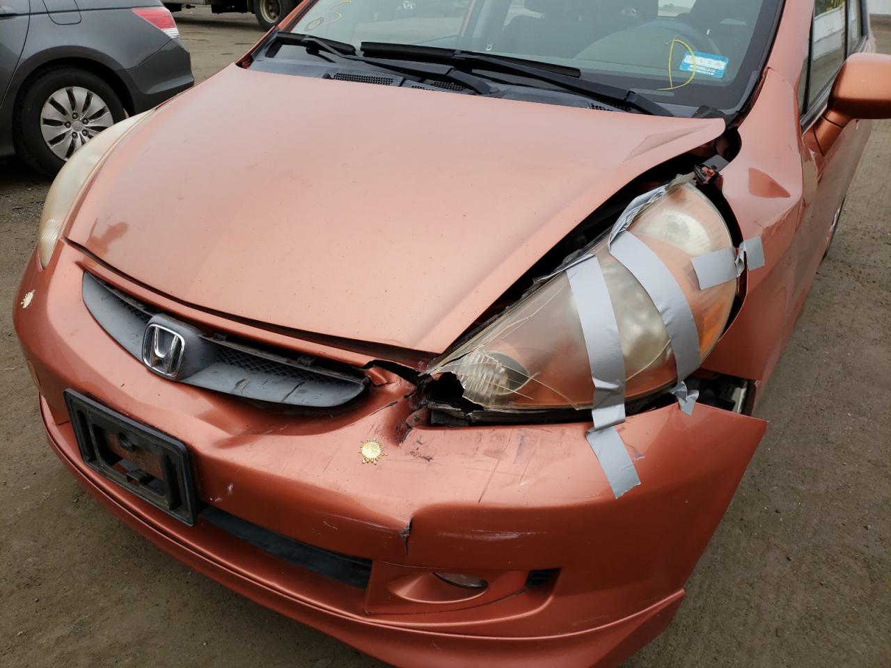 Photo 9 from auction – 2007 HONDA FIT S with VIN JHMGD38697S065391