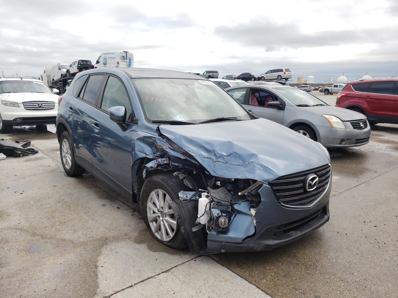 MAZDA CX-5 TOURI 2016 with VIN JM3KE2CYXG0849190 - Photo from auction