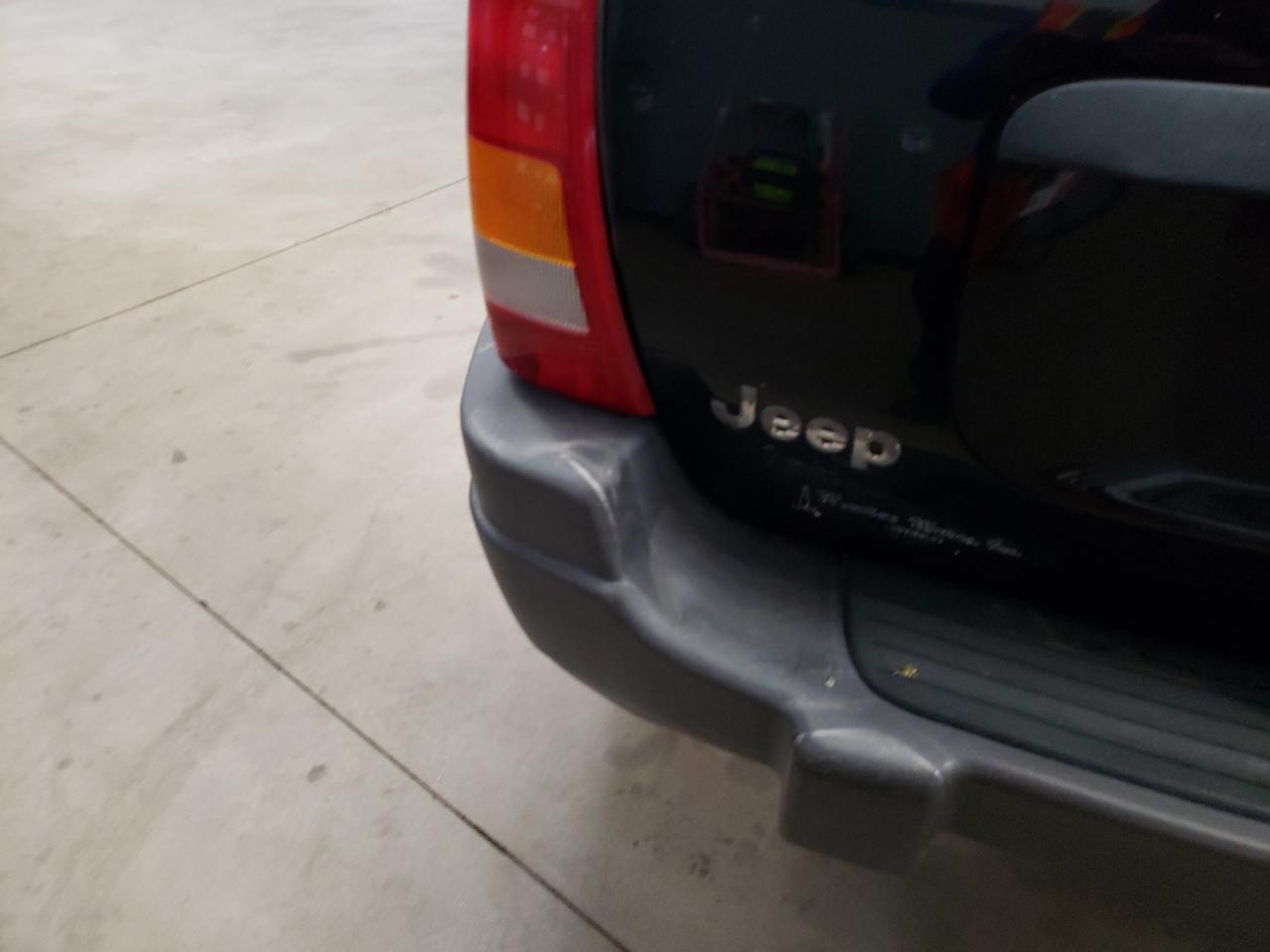 Photo 9 from auction – 2001 JEEP GRAND CHER with VIN 1J4GW48SX1C545630