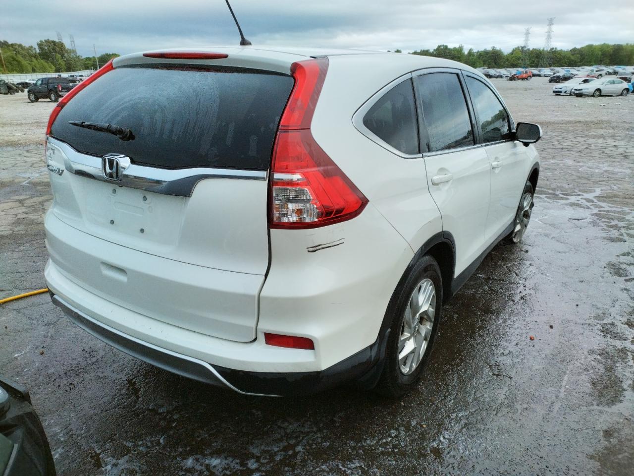 Photo 17 from auction – 2016 HONDA CR-V EX with VIN 5J6RM3H50GL017252