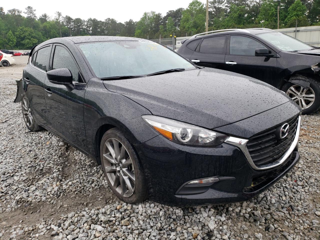 MAZDA 3 TOURING 2018 with VIN 3MZBN1L33JM218290 - Photo from auction