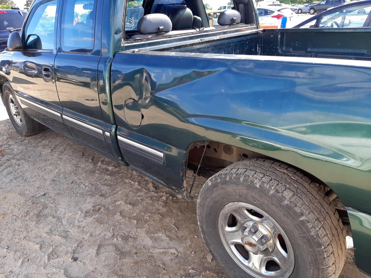 Photo 9 from auction – 2001 CHEVROLET SILVRK1500 with VIN 2GCEC19TX11223877