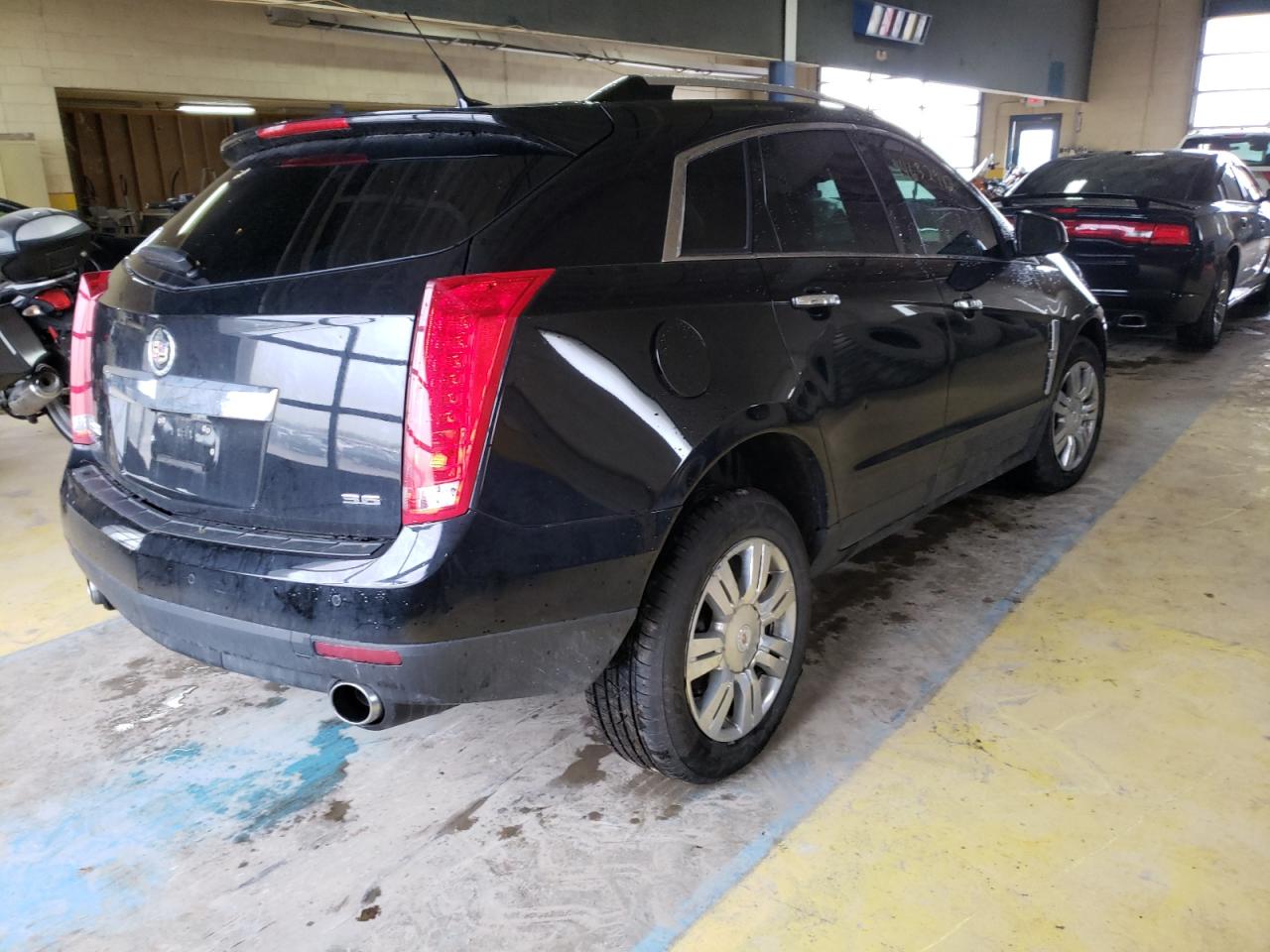 Photo 4 from auction – 2012 CADILLAC SRX LUXURY with VIN 3GYFNDE35CS660080