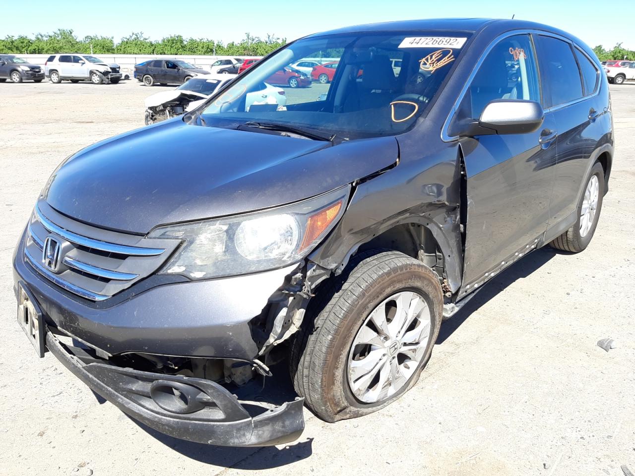 Photo 2 from auction – 2014 HONDA CR-V EX with VIN 5J6RM3H58EL031882