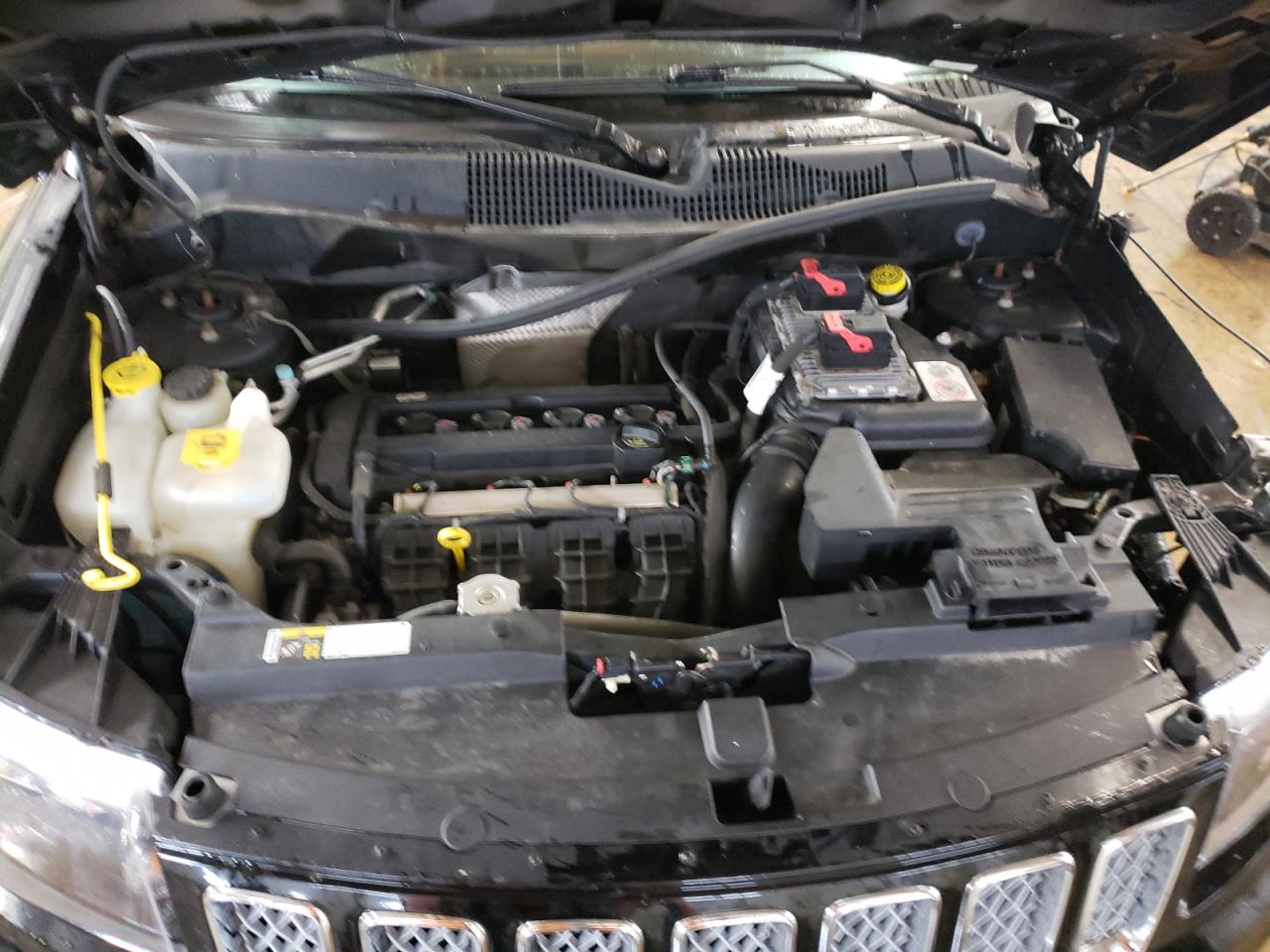 Photo 7 from auction – 2016 JEEP COMPASS LA with VIN 1C4NJCEA5GD576000