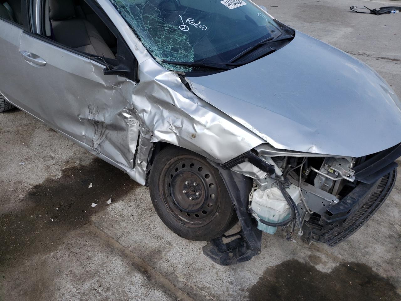 Photo 18 from auction – 2014 TOYOTA COROLLA L with VIN 2T1BURHE0EC027276