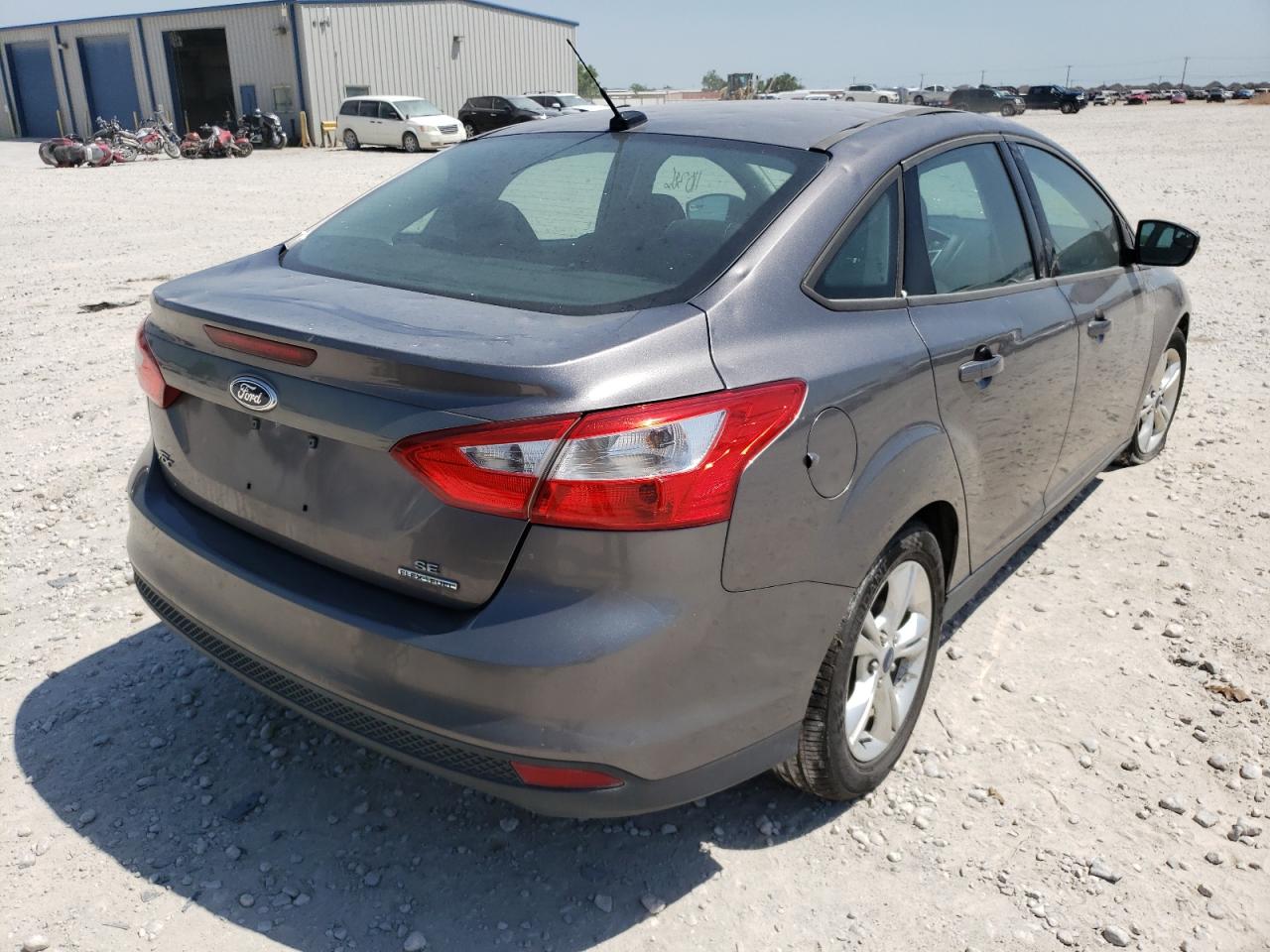 Photo 4 from auction – 2014 FORD FOCUS SE with VIN 1FADP3F28EL392809