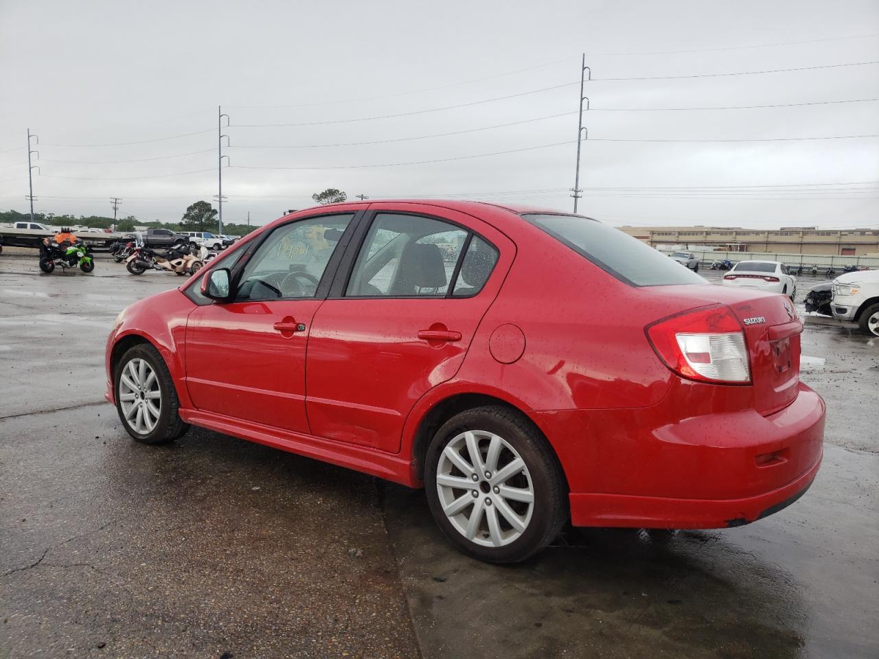Photo 9 from auction – 2012 SUZUKI SX4 SPORT with VIN JS2YC5A51C6300364
