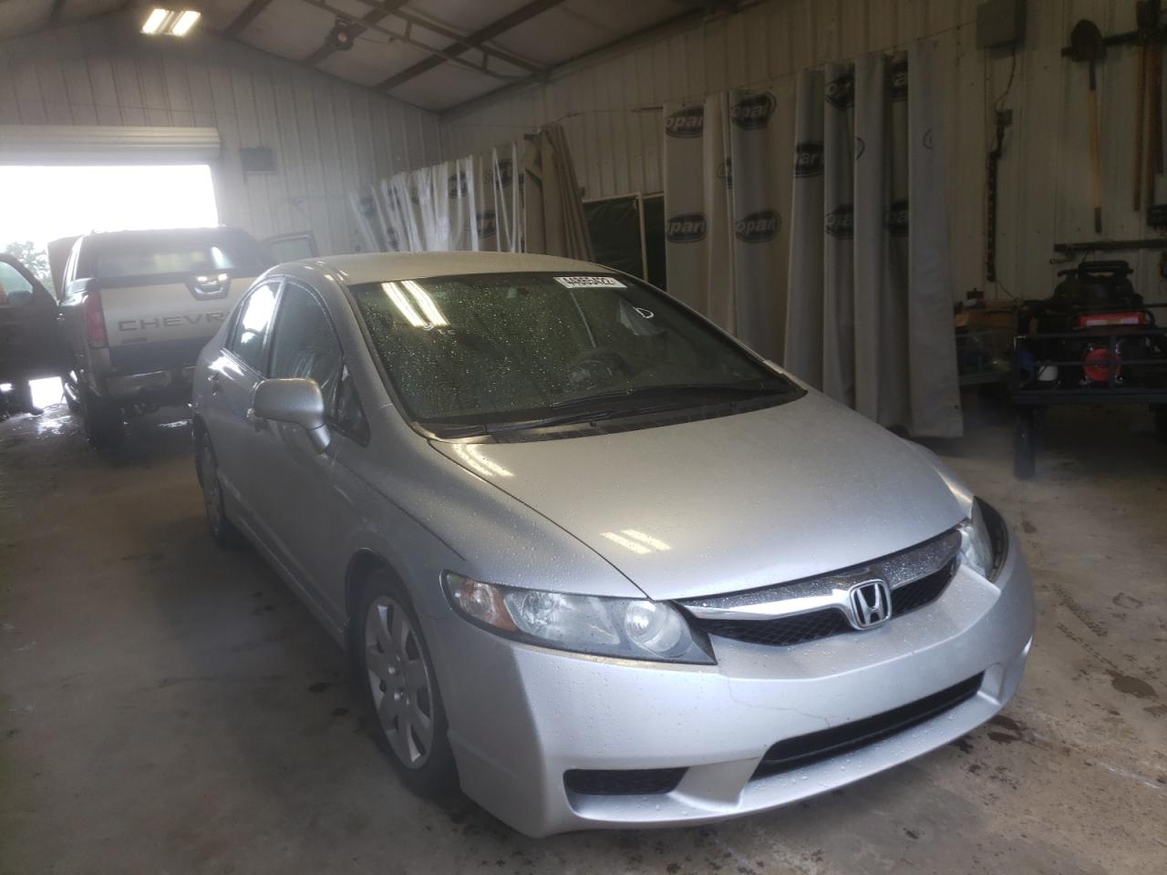 HONDA CIVIC LX 2010 with VIN 2HGFA1F51AH306607 - Photo from auction