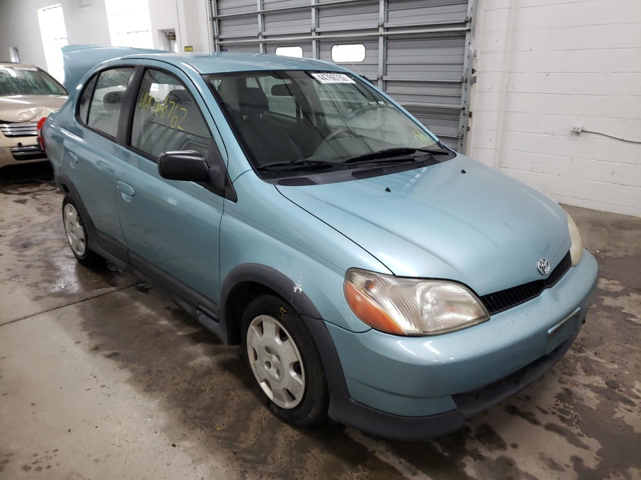 TOYOTA ECHO 2002 with VIN JTDBT123220229053 - Photo from auction