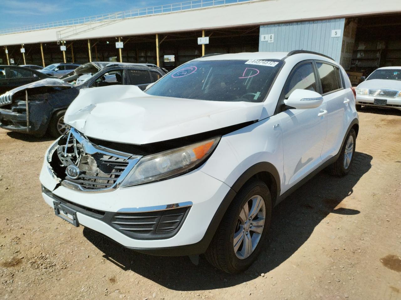 Photo 2 from auction – 2012 KIA SPORTAGE L with VIN KNDPBCA28C7257302