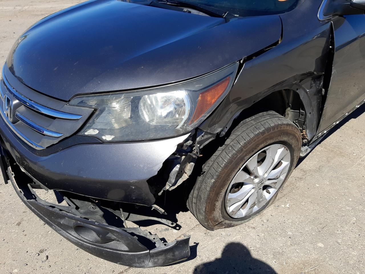 Photo 9 from auction – 2014 HONDA CR-V EX with VIN 5J6RM3H58EL031882