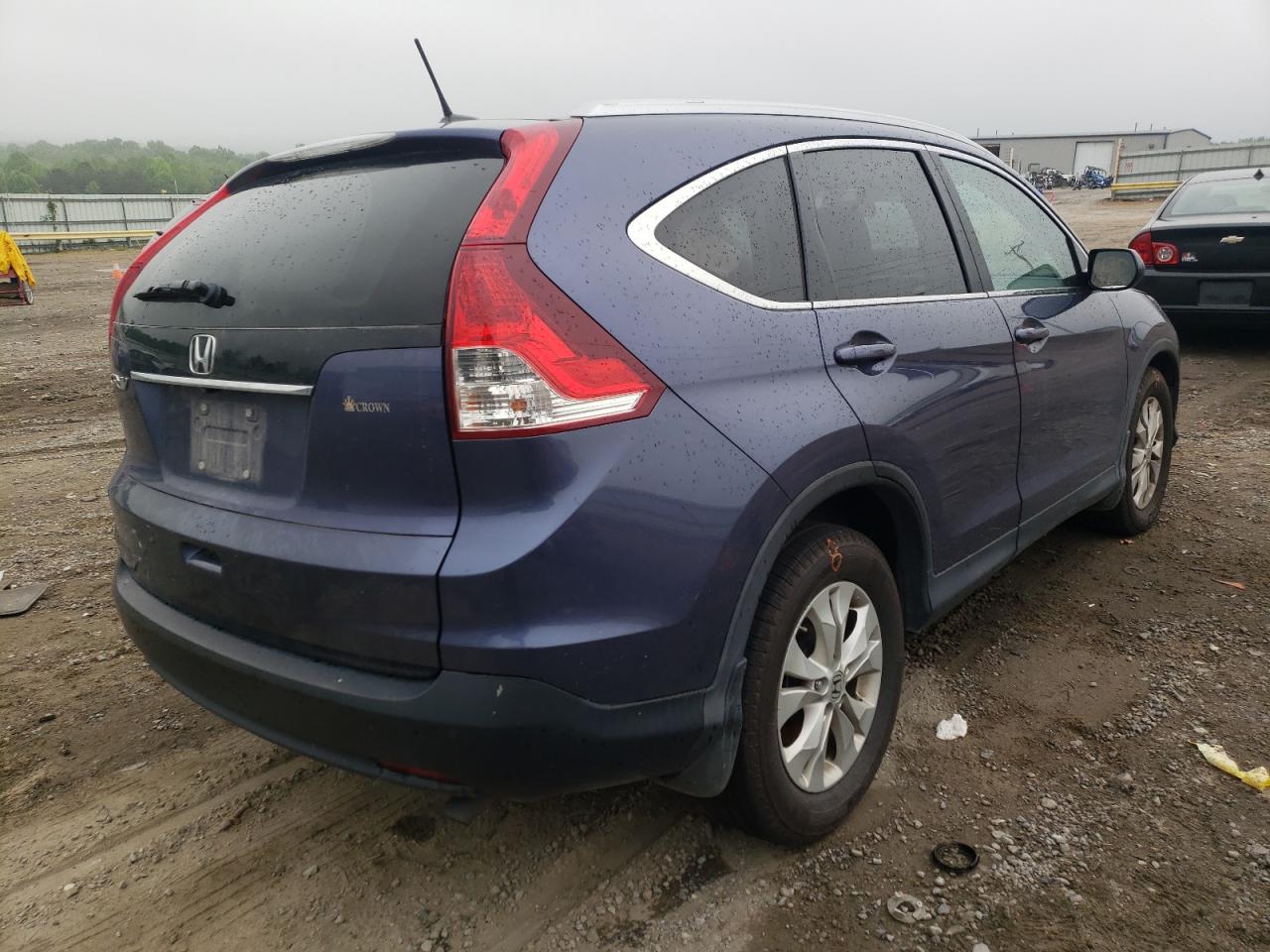 Photo 4 from auction – 2013 HONDA CRV with VIN 2HKRM3H79DH513190