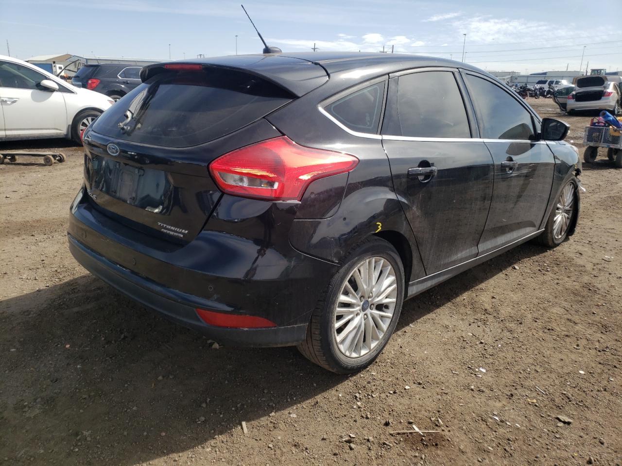 Photo 4 from auction – 2015 FORD FOCUS TITA with VIN 1FADP3N23FL275089