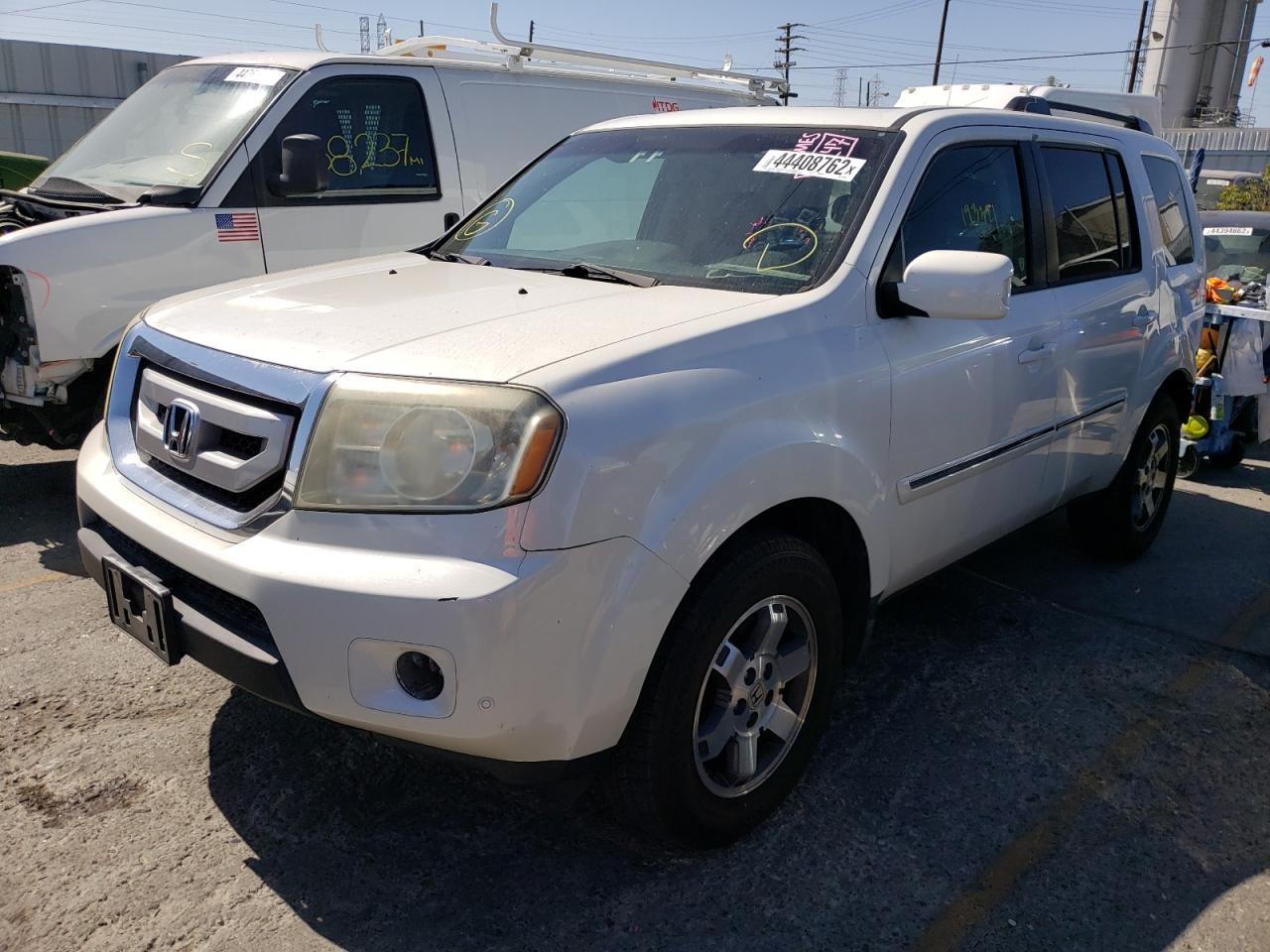 Photo 2 from auction – 2011 HONDA PILOT TOUR with VIN 5FNYF4H98BB040200